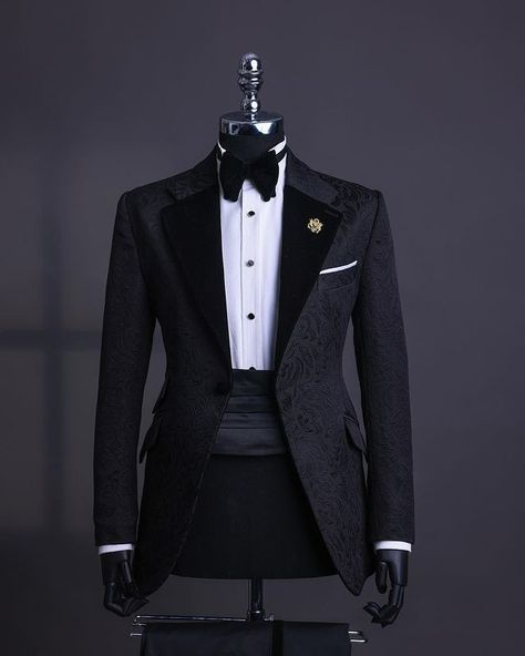 A charcoal black, floral notch lapel tuxedo suit, tux pant trosuer & bow tie

What you get :

suit
pant trousers
Tie

Other items on request:

Signature Accessories
Shirt

Price - available on website

To Order:

iMessage, Text or WhatsApp : +2348179435662
Email: info@dejiandkola.com
Website: www.dejiandkola.com Black Tuxedo Suit For Men, Wedding Suits Men Black Tuxedos, All Black Tuxedo For Men, Velvet Suits Men, Tuxedo For Men Wedding Classy, Black Tuxedo For Men, Classic Suits For Men, Suit Accessories For Men, Luxury Suits For Men