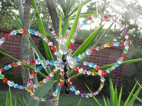 crystal garden sun catcher, diy home crafts, The sun catches and the crystals sparkle I have a rainbow on the patio everyday Mesh Wreath Tutorial, Old Baskets, Crystal Garden, Hummingbird Garden, Globe Decor, Diy Plant Stand, Outdoor Crafts, Crystal Butterfly, Wire Crafts