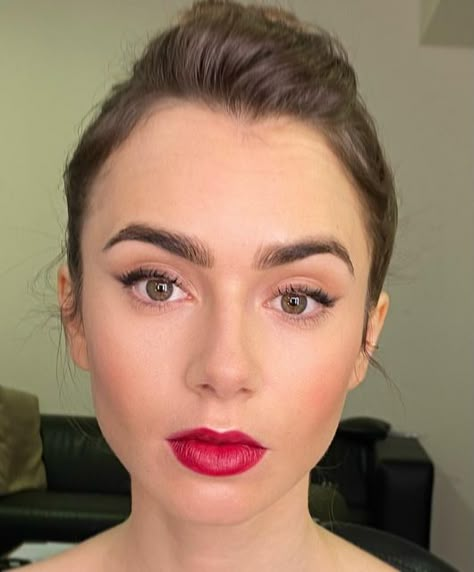 Aurélie PAYEN on Instagram: "Behind the scene ✨Emily in Paris Season 2 ✨ Episode 6 💄For this look I used a plum red deep lipstick with matte finish Beauty team #lilyjcollins ❤️ @lilyjcollins Stylist @mshangaimx @patriciafield @sarahnakhlecerruti Makeup @aureliepayenmakeup Hairstylist @mikedesir @emilyinparis @netflix" Parisian Makeup Look, Deep Lipstick, Lily Collins Makeup, Parisian Makeup, Emily In Paris Lily Collins, Emily In Paris Outfits, Plum Lipstick, Red Lipstick Makeup, Makeup Secret