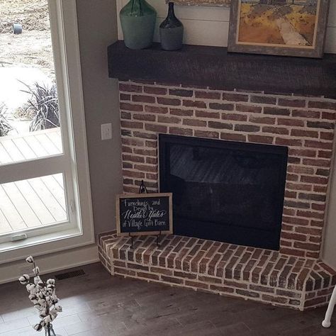 Heather Yates Interiors on Instagram: "It's almost the weekend! And we spring forward- which means..spring is right around the corner 🙌🏻 . We did a corner fireplace with a mortar wash to give it added texture and the mantel we used reclaimed wood. I wanted to create a casual space in this room since it's open to the kitchen area - perfect for entertaining guests! . . #modernfarmhouse #casualgreatroom #greatroom #farmhousedecor #homedecor #casualfarmhouse #openfloorplan #highceilings #brick #mortarwash #brickfireplace #cornerfireplace #reclaimedwood #mantel #seating #entertaining #heatherhatesinteriors" Brick Corner Fireplace, Corner Brick Fireplace, Corner Brick Fireplaces, Brick Corner, Mortar Wash, Farmhouse Addition, Red Brick Fireplaces, Brick Hearth, White Wash Brick