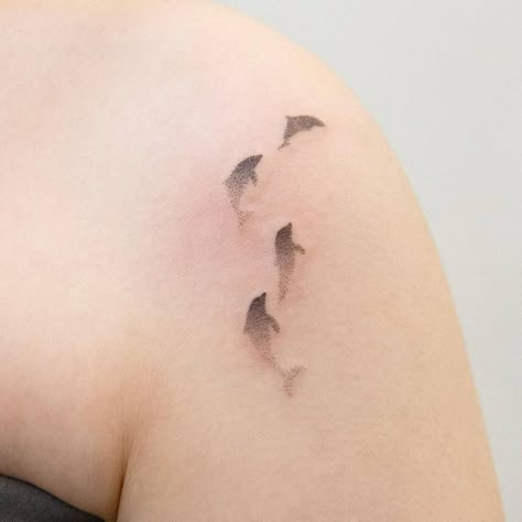 Dotwork dolphins tattoo on the shoulder. Animal Silhouette Tattoo, Tattoo On The Shoulder, Aquatic Tattoo, Ocean Life Tattoos, Animals Dolphins, Seal Tattoo, Dolphin Tattoo, Silhouette Tattoo, Watercolor Tattoo Ideas