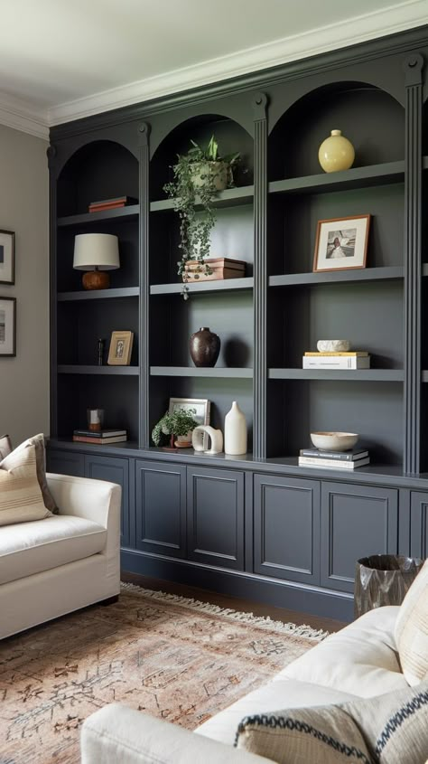 Gray Shelves In Living Room, Gray Built In Bookshelves, Front Room Bookshelves, Dark Builtins Living Room, Moody Living Room Built Ins, Dark Grey Library, Monochromatic Built Ins, Black Book Shelves Living Room, Living Room Designs Bookshelves