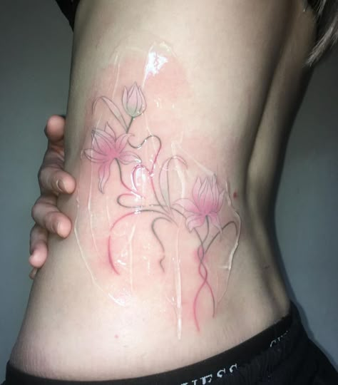 Matching Asian Tattoos, Colorful Spine Tattoo, Asian Art Tattoos, Black And Pink Tattoo, Cherry Blossom Spine Tattoo, Aesthetic Back Tattoo, Hip Flower Tattoo, Pink Ink Tattoo, Flower Tattoo On Back