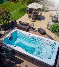 Swim Spa Deck Ideas, Spa Deck Ideas, Backyard Swim Spa, Swim Spa Prices, Swim Spa Ideas, Swim Spa Deck, Outdoor Swim Spa, Swim Spa Landscaping, Spa Deck