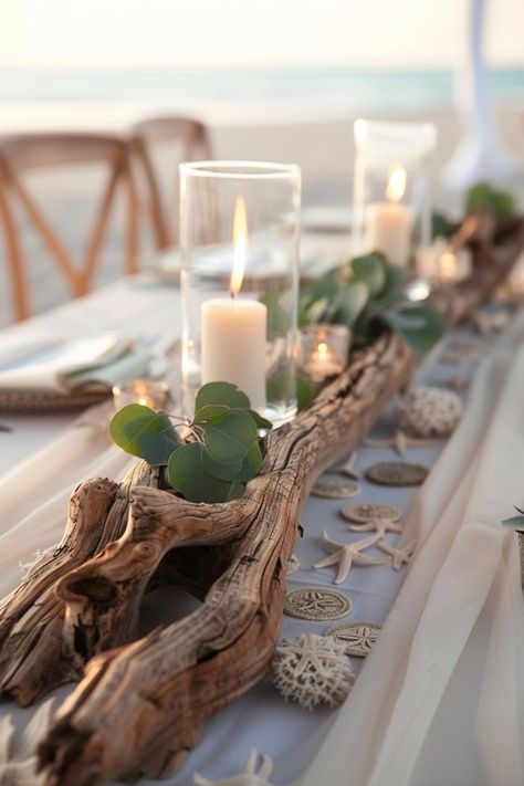 Driftwood centerpieces bring a natural, coastal element to your wedding decor. Get inspired here. Small Island Wedding Ideas, Beach And Forest Wedding, Nautical Wedding Inspiration Table Decor, Wedding Decor Beach Theme, Beach Party Decor Ideas, Beachy Boho Wedding Decor, Natural Theme Wedding, Beach Flower Wedding, Island Theme Wedding Decor