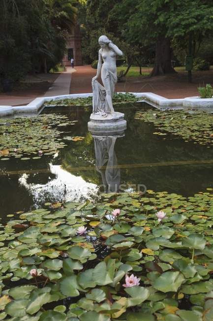 Statue In A Pond In The Palermo Botanical Gardens — nature, jardin botanical - Stock Photo | #164920586 Greek Statue Garden Aesthetic, Pond Statues, Statue In Garden, Aesthetic Fountain, Beautiful Fountains, Fountain Statue, Fountain Pond, Greek Paintings, Outdoor Ponds