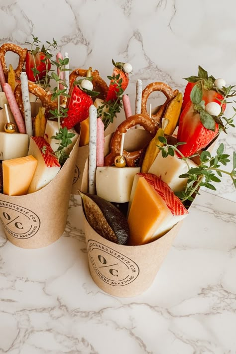 Festive and Yummy Snacks for a Holiday Event: Charcuterie Christmas Cups | Ozark Charcuterie | Elevate your holiday event with Charcuterie Christmas Cups! Perfect for a merry gathering, these delicious snacks add a touch of warmth to your seasonal get-together. Treat your guests to a flavorful feast and make your celebration a delicious and memorable occasion. #charcuterie #charcuterieboard #grazetable #charcuteriecup #smallbusiness #partycharcuterie #holidays #party Jarcuterie Cups, Charcuterie Tables, Charcuterie Christmas, Christmas Catering, Birthday Gathering, Fall Charcuterie, Charcuterie Cups, Charcuterie Spread, Italian Party