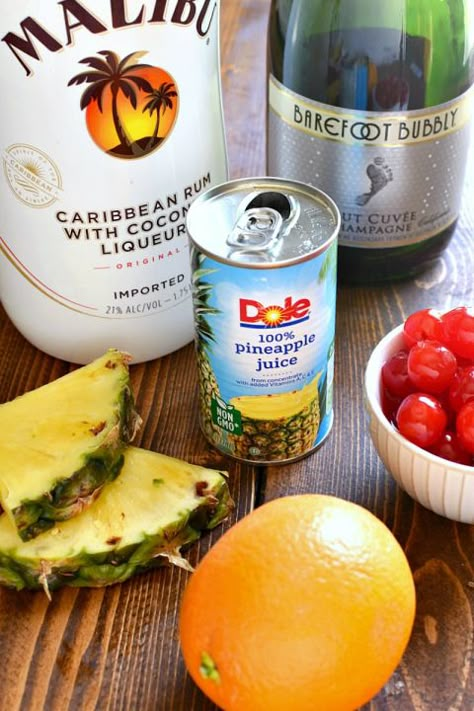 These Tropical Mimosas are my favorite new breakfast cocktail! They combine traditional mimosas with Malibu Rum and pineapple juice for a tropical drink that's perfect for summer! Malibu Rum And Pineapple Juice, Rum And Pineapple Juice, Breakfast Cocktail, Malibu Rum Drinks, Malibu Cocktails, Malibu Drinks, Rum Punch Recipes, Breakfast Cocktails, Mimosa Recipe