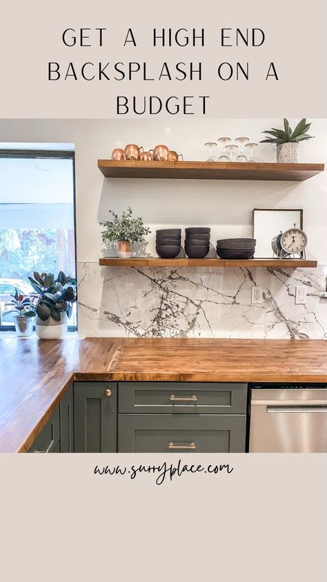 I am in love with the slab backsplash trend, but it just wasn’t in my budget. So I found these 24” x 48” porcelain tiles at @flooranddecor… | Instagram Budget Kitchen Backsplash Ideas, Marble Backsplash Butcher Block Counter, Kitchen Slab Backsplash, Slab Backsplash, Slab Backsplash With Shelf, Large Kitchen Tiles, Marble Tile Backsplash Kitchen, Porcelain Tiles Kitchen, Black & White Tile Backsplash Butcher Block Shelves