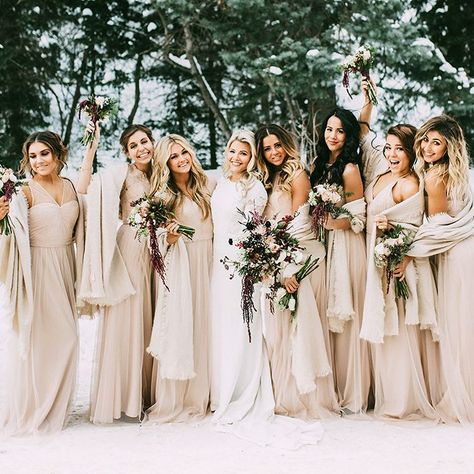 Brides.com: . Dancing with the Stars' Lindsay Arnold, Emma Slater, Jenna Johnson, and Brittany Cherry. Just imagine the dance floor at this reception! DWTS pro, Witney Carson, called upon her twirling co-stars to serve as bridesmaids at her New Year's Day wedding. Lindsay Arnold, Emma Slater, Jenna Johnson, and Brittany Cherry all donned matching pale pink Amsale gowns and wintery wraps for the occasion. Wedding Color Schemes Winter, Winter Wedding Bridesmaids, Winter Wedding Color Palette, Winter Bridesmaids, Winter Wedding Photos, Winter Bridesmaid Dresses, Champagne Bridesmaid, Champagne Bridesmaid Dresses, Winter Wedding Colors