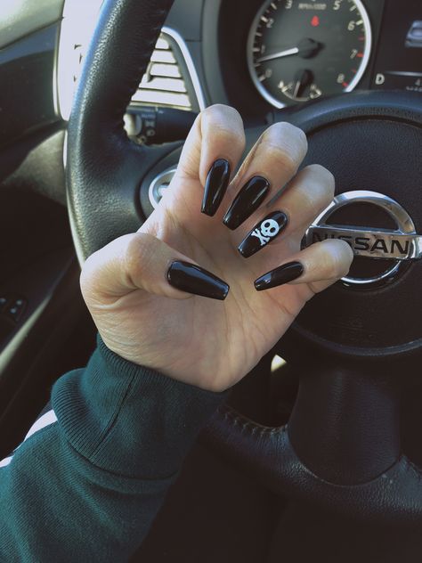 Halloween nails! Skeleton accent on black nails. Coffin shape acrylic nails Mate Acrylic Nails, Black Nails Halloween Coffin, Coffin Shaped Nails Halloween, Goth Coffin Acrylic Nails, Black Nails Accent Nail, Nails With Skulls, Black Nails Edgy, Black Goth Nails Acrylic, Emo Black Nails