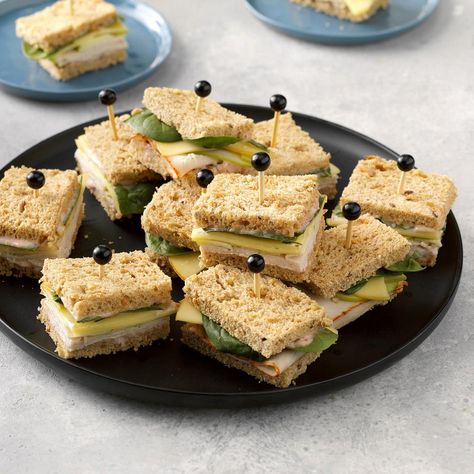 Cut into triangles or quarters, these fun mini sandwiches are a tasty addition to an afternoon tea gathering. The cranberry mayo lends an original flavor twist, and the apples give them a sweet-tart crunch. —Taste of Home Test Kitchen Cranberry Walnut Chicken Salad, Cranberry Mayo, Walnut Chicken Salad, Summer Picnic Food, Cranberry Chicken Salad, Tea Party Sandwiches, Tea Sandwiches Recipes, Party Sandwiches, Cold Lunches