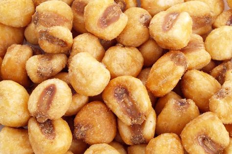 Contrary to their name, corn nuts are not nuts, but they're just as satisfying as a crunchy snack. They're made by deep frying [corn](http://www.leaf.tv/videos/grilled-corn-crostinis-2014/) kernels until they're hard and brittle, and then seasoning them. Look for dried white corn ... Homemade Corn Nuts, Corn Nuts Recipe, Corn Nut, Trip Snacks, How To Make Corn, Corn Snacks, After School Snack, Healthy Nuts, Homemade Crackers