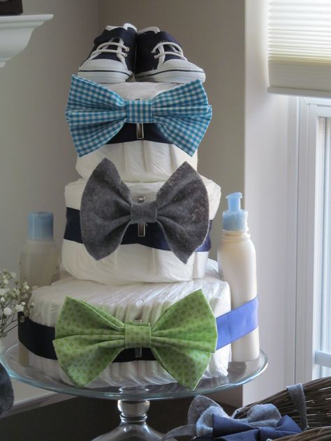 Bowtie and chevron themes baby shower. Diaper cake! Lil Man Baby Shower, Work Baby Showers, Boy Shower Themes, Mustache Baby Shower, Man Shower, Baby Boy Shower Ideas, Boy Shower Ideas, Baby Shower Diaper Cake, Trendy Baby Shower Ideas