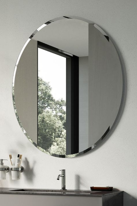 This frameless mirror is the perfect addition to any minimalist living room. Its clean lines and simple design allow it to blend seamlessly with any decor. Its reflective surface adds depth and dimension to the space. #livingroomdecor #minimalistdesign #custommirror #cleanlines #simplicity #dimension Rimless Round Mirror, Circle Mirror Frameless, Stainless Steel Vanity Mirror, Circle Mirror Silver, Frameless Beveled Mirror, Entrance Mirror, Rustic Entryway, Minimalist Living Room Decor, Wall Mounted Hooks