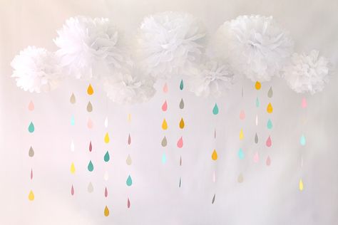 Create a multidimensional backdrop with white tissue pom poms as clouds, with colorful raindrop cutouts dangling beneath. Rainbow Baby Shower Theme, Rainbow Theme Baby Shower, Clouds Rainbow, Sprinkle Ideas, Sprinkle Shower, Trendy Baby Shower Ideas, Sprinkle Baby Shower, Unicorn Baby Shower, Rainbow Baby Shower