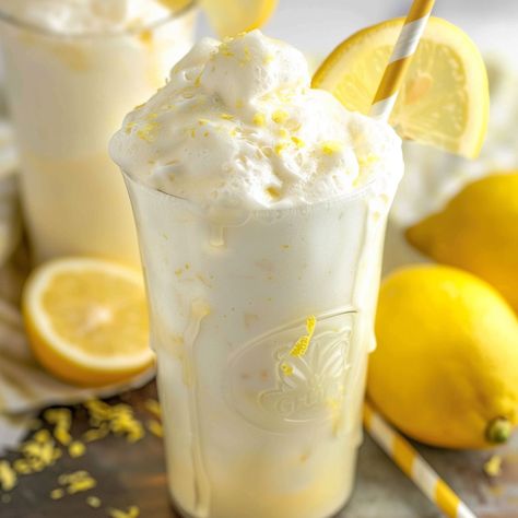 Chick-fil-A Frosted Lemonade Frosted Lemonade Chick Fil A, Key Lime Lemonade, Lime Lemonade, Frosted Lemonade, Lemonade Concentrate, Coconut Shavings, Peach Ice Cream, Coconut Frosting, Berry Compote