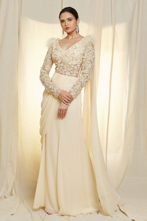 Buy Ivory Georgette Hand Embroidered Resham Dori V Neck Cocktail Saree Gown For Women by Vivek Patel Online at Aza Fashions. Full Sleeve Blouse Designs For Lehenga, Cocktail Gowns Indian Weddings, Full Hand Blouse Designs For Saree, Aza Fashion Outfits, Western Outfits Women Party Cocktail Dresses, Unique Saree Designs, Wedding Cocktail Attire For Women, Unique Indo Western Outfits For Women, Unique Saree Draping