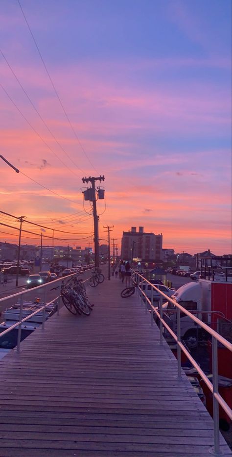 Aesthetic sunset boardwalk image Vintage Boardwalk Aesthetic, Outskirts Of Town Aesthetic, Wildwood Aesthetic, Beach Boardwalk Aesthetic, Miranda Aesthetic, Boardwalk Aesthetic, Boardwalk Sunset, Beach Town Aesthetic, Summer Boardwalk