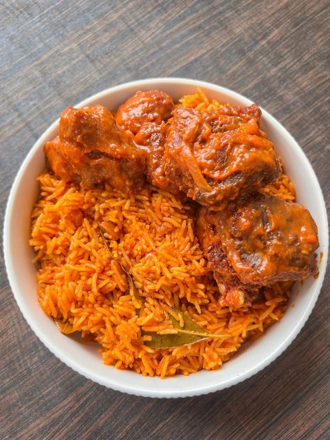 Explore the streets of Nigeria with this authentic Jollof Rice recipe. Bursting with flavors, this Nigerian dish is a delight for both meat lovers and fans of African food. Learn how to cook this easy rice recipe to create a balanced and delicious meal. Whether you're hosting a dinner party or craving a weeknight dinner, this recipe will become a staple in your kitchen. Enjoy the rich traditions of West African cooking. African recipes Nigerian food, West African foodrn Party Jollof Rice Nigerian, Nigeria Food Recipes How To Cook, African Dishes Nigerian Food, Rice And Turkey, Naija Babe, Jollof Rice Nigerian, Nigerian Jollof Rice, Party Rice, Jollof Rice Recipe