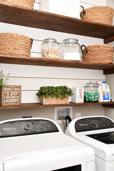 Our favorite part of the new laundry room is definitely the shiplap and shelving. It provides a lot of extra storage, plus the entire thing cost us less than $80. And it was super easy to complete! First thing we did was measure the back wall of our laundry room above the washer and dryer. … Budget Laundry Room Makeover, Laundry Room Organization Storage, Laundry Room Storage Shelves, Laundry Shelves, Diy Wood Stain, Diy Storage Ideas, Small Laundry Room Organization, Diy Wood Shelves, Room Storage Diy