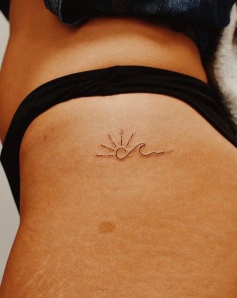 Sunset Wave Tattoo Minimalist, Hip Wave Tattoos Women, Beach Sun Tattoo Ideas, Tattoo Sunset Beach, Sun On Ribs Tattoo, Small Tattoo Beach, Tattoos To Get At The Beach, Sunset And Beach Tattoo, Fine Line Waves Tattoo