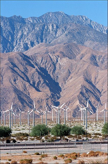 San Gorgonio Pass Wind Farm, Desert Hot Springs, California. San Jacinto Mountains in the background. Near Palm Springs 🗺 🚗 🚌 ✈️ 🎒 🚊 🏍️ 🚀 Welcome to www.VisualTshirt.com 👕 Shop Your Perfect Traveling Apparel - T-shirt, V-neck, Long Sleeve, Hoodie & More  . . #hotsprings #travel #nature #japan #spa #photography #travelphotography #holiday #mountains #love #outdoors #relax #trip #instagood #adventure #roadtrip #onsen #wanderlust #hiking #christmas #iceland #travelblogger #winter #instatrav Desert Cities, San Jacinto Mountains, Desert Southwest, Desert Hot Springs, American Landscape, Travel America, California Desert, Wind Turbines, Desert Life