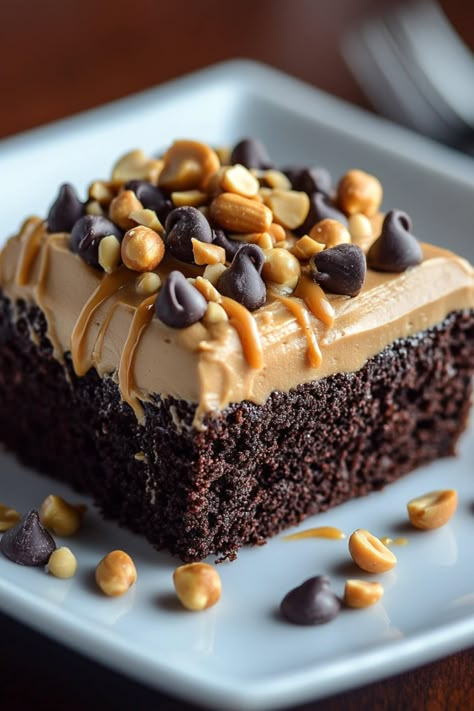 Get ready to dive into your new favorite sweet treat, aka peanut butter chocolate poke cake! It’s fudgy, creamy, and full of peanut butter goodness. Homemade Peanut Butter Tandy Cakes, Flourless Chocolate Peanut Butter Cake, Chocolate Pb Desserts, Peanut Butter Dump Cake Recipes, Chocolate Cake Peanut Butter Frosting, Easy Peanut Butter Sheet Cake, Chocolate Cake With Peanut Butter Frosting, Chocolate Cake With Peanut Butter Icing, Reese’s Cake