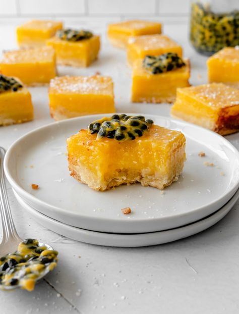 These easy Passion Fruit, or Lilikoi, Bars have a buttery shortbread cookie crust and a soft passion fruit curd filling. It only needs 6 ingredients and is a fun tropical twist on the classic lemon bars. This delicious dessert recipe is perfect for parties, picnics, and holidays. Dairy-free and vegetarian. Passion Fruit Bars, Fruit Curd, Classic Lemon Bars, Hawaiian Desserts, Shortbread Cookie Crust, Passion Fruit Curd, Fruit Bars, Curd Filling, Asian Dinner Recipes