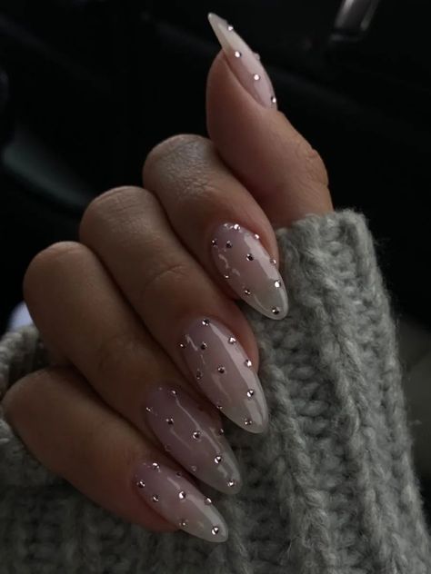 Jems On Nails, White With Rhinestones Nails, French Manicure Pearl, White Reflective Nails, Nails Inspo January, Ring Finger Nail Art Designs, Silver Nail Charms, Square Nye Nails, Clean Nails Aesthetic Design