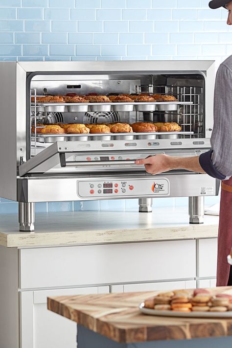 Person taking muffins out of a steam injection oven. Baking Station, Countertop Convection Oven, Roasting Vegetables, Home Bakery Business, Commercial Ovens, Small Bakery, Bakery Design Interior, Bakery Kitchen, Busy Kitchen