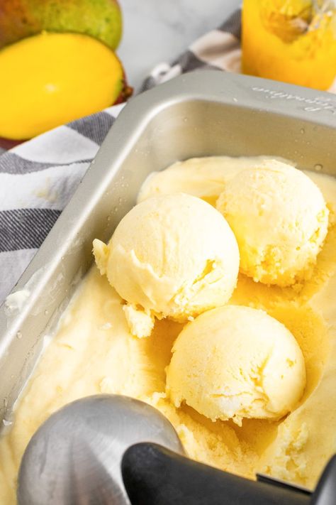 scoops of homemade mango ice cream Dough Enhancer, Homemade Frozen Yogurt Recipes, Vegan Mango Ice Cream, Cheap Baking, Homemade Mango Ice Cream, Mango Ice Cream Recipe, Homemade Frozen Yogurt, Orange Ice Cream, Ice Cream Vegan