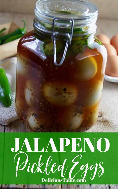 Large clamp jar filled with pickled eggs with Jalapenos. Pickled Egg Recipes Spicy, Pickled Eggs With Pickle Juice, Jalapeno Pickled Eggs Recipes, Jalapeno Pickled Eggs, Hot Pickled Eggs Recipe, Jalapeño Pickled Eggs, Cajun Pickled Eggs, Best Pickled Eggs Recipes, Buffalo Pickled Eggs Recipe