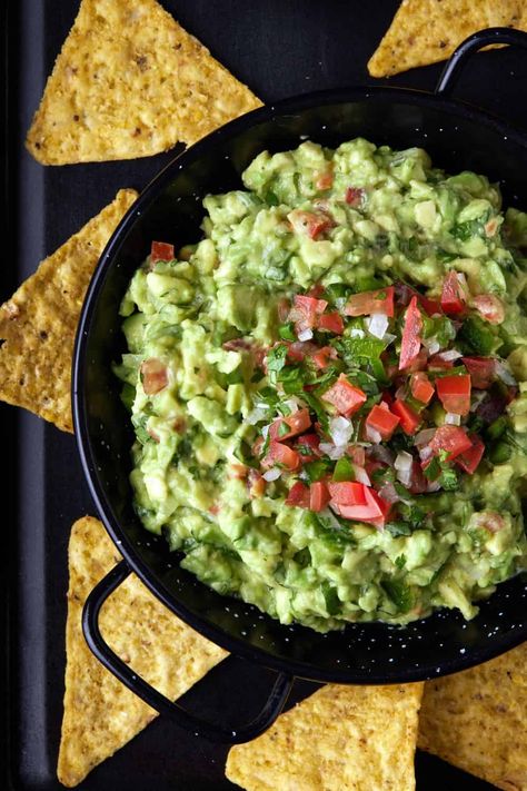 This Chunky Guacamole with Pico de Gallo is my go-to guacamole recipe. Loaded with creamy avocados, juicy tomatoes, spicy jalapeño, fresh cilantro, tangy lime juice and chopped onion, it's the best version of the classic guacamole dip that always disappears. Chunky Guacamole Recipe, Avocado Appetizer, Appetizers Cold, Party Food For A Crowd, Spicy Guacamole, Chunky Guacamole, Guacamole Dip, Authentic Mexican Recipes, Hot Appetizers