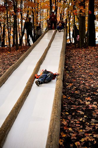 This looks like fun!  Taken at Patterson Farms in Ohio, this slide is 50 feet long and is hidden in the woods next to a big wooden fort! Wooden Fort, Diy Playground, Outdoor Play Area, Kids Outdoor Play, Playground Ideas, Play Ground, Natural Playground, Playground Design, Outdoor Classroom