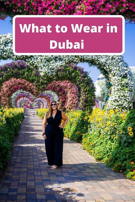 Hannah standing in Dubai miracle gardens with banner text reading what to wear in Dubai Dubai Outfits Ideas Curvy, Outfit Inspo For Dubai, Dubai Clothes What To Wear In, Nails For Dubai Vacation, Dubai Attire For Women, Dubai Womens Fashion, Travel Capsule Wardrobe Dubai, Plus Size Dubai Outfits, What To Wear In Dubai Outfits Vacations