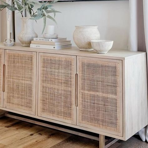 Our most-loved sideboard, The Clarita 🤍 This texture-driven sideboard features white mango door fronts with natural cane paneling for a natural look #StyleMeGHD ⠀⠀⠀⠀⠀⠀⠀⠀⠀ Modern Coastal Sideboard, Coastal Buffets And Sideboards, Cheap Beach House, Cane Paneling, Minimal Neutral Home, Natural Wood Sideboard, Wooden Sideboards, Cane Cabinet, Cane Sideboard