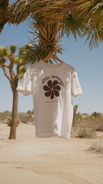 Hôtel Magique on Instagram: "Eva and her grandpa🌿 The Wake up - Maybe later t-shirt and tote bag are now availabe in our souvenir shop🌿 HOTELMAGIQUE.COM #hotelmagique" Hotel Magique Print, White Hawaiian Vacation T-shirt, Vintage Relaxed Fit T-shirt For Beach, Vintage Souvenir Shirt, Vacation Surfing Graphic Print T-shirt, Souvenir Shop, Latest T Shirt, Wake Up, Hotel