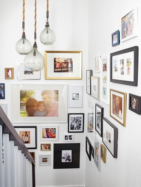 Try a gallery of photos in varying sizes #hgtvmagazine http://www.hgtv.com/decorating-basics/when-emily-henderson-designs-your-home/pictures/page-3.html?soc=pinterest تحت الدرج, Gallery Wall Staircase, Emily Henderson Design, Stairway Decorating, Display Family Photos, Eclectic Gallery Wall, Gallery Wall Inspiration, Emily Henderson, A3 Size