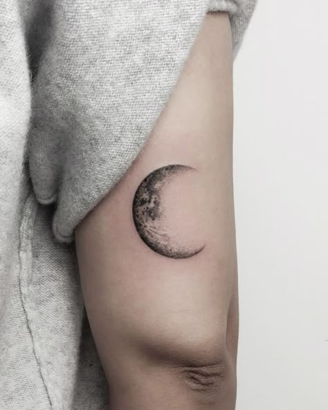 The Future Is Up! 25 Space Tattoos to Explore This Huge 2021 Tattoo Trend | After getting to Mars earlier this year, people have celebrated the cosmos with new space tattoos! Check out our favorites! Lifestyle Back Of Arm Tattoo Ideas, Waning Crescent Moon Tattoo, Moon Cycle Tattoo, Realistic Moon Tattoo, Waning Crescent Moon, Tricep Tattoos, Half Moon Tattoo, Luna Tattoo, Rocket Tattoo