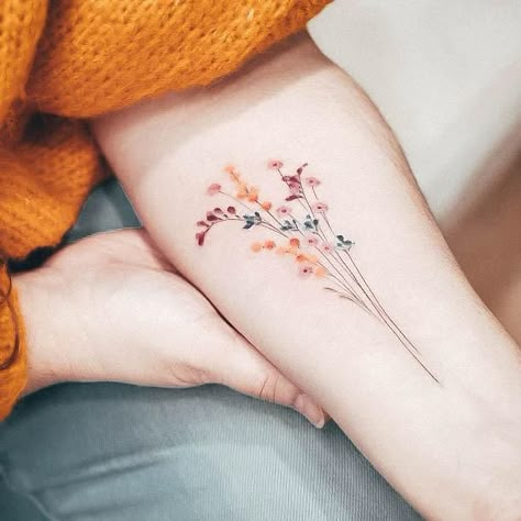 Spring Tattoo Ideas Nature, Dandelion Wildflower Tattoo, Aesthetic Forearm Tattoo, Wildflower Tattoo Shoulder Cap, Small Wildflower Tattoo Color, Wildflower Wrap Around Tattoo, Simple Wildflower Tattoo, Wildflower Tattoo Forearm, Meadow Flowers Tattoo