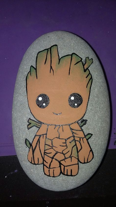 Groot painted rock- kindness rocks project Groot Painted Rock, Superhero Rock Painting, Groot Rock Painting, Disney Painted Rocks Ideas, Family Rock Painting, Character Rock Painting, Rock Painting Disney, Rock Painting Ideas Disney, Disney Painted Rocks