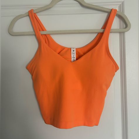 Never Worn Orange Size 6 But Fits 4 Fitness Fashion Active Wear, Neon Tank Top, Nike Spandex, Lululemon Align Tank, Lululemon Tank Top, Orange Tank Top, Casual Preppy Outfits, Racerback Tank Top, Preppy Outfits