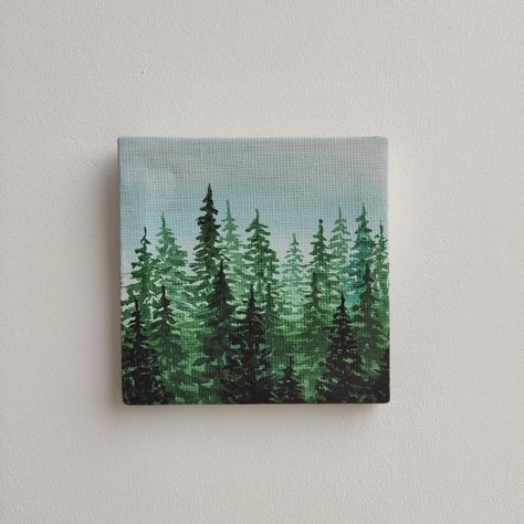 Original small 100% hand painted acrylic canva. Mini forest, Landscape. Spruces and pines painting, tree tops. NOT a print *Size 8x8x0.5 cm Canvas doek It’s painted on all sides, so it looks attractive from any angle. It is a perfect size to sit on your office desk. Great placing on a bedside table or bookcase. The small wooden easel is included. You can also hang up on your wall. It is a delightful gift for your loved ones. Thank You For Visiting My Shop Green Mini Paintings, Mini Canvas Forest Painting, Forest Painting On Canvas, Ivy Painting Acrylic, Easy Woodland Painting, Forest Canvas Painting Easy, Mini Forest Painting, Green Paintings Ideas, Mini Canvas Art Green