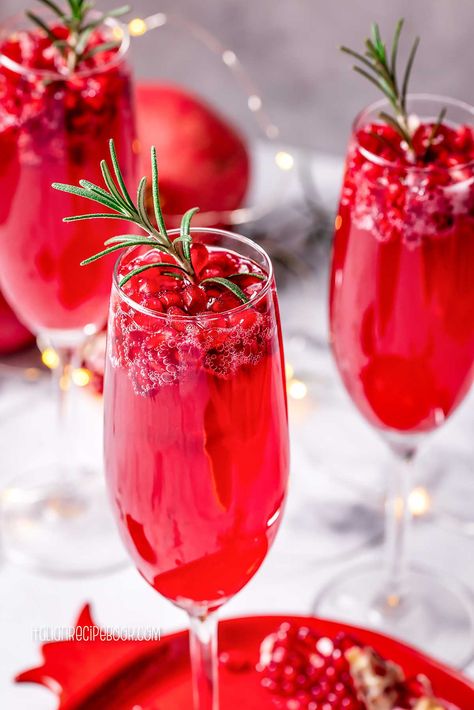 Holiday Champagne Cocktails, Poinsettia Drink, Cranberry Champagne Cocktail, Poinsettia Cocktail, Lime Garnish, Best Christmas Cocktails, Raspberry Juice, Christmas Cocktails Easy, Kid Friendly Drinks