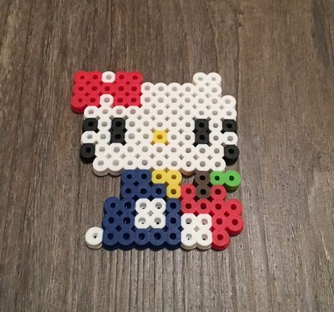 Perler Beads Hello Kitty Hello Kitty Perler Beads Easy, Hello Kitty Melting Beads, Hello Kitty Iron Beads, Perler Beads Ideas Hello Kitty, Hello Kitty Melty Beads, Hello Kitty Pearl Beads, Perler Bead Patterns Hello Kitty, Hello Kitty Fuse Beads, Hello Kitty Perler Beads Pattern