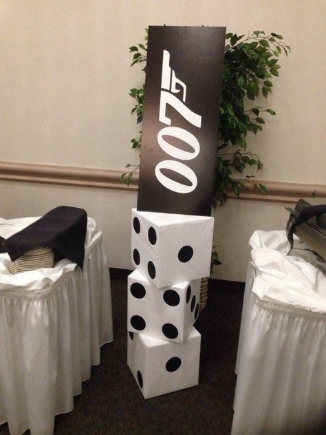 James Bond theme party...floor decor. James Bond Theme Centerpieces, James Bond Party Decorations Centerpieces, James Bond Theme Table Decorations, James Bond 007 Theme Party, James Bond Centerpiece Ideas, James Bond Table Decorations, Spy Party Decorations, James Bond Theme Party Decoration, James Bond Prom