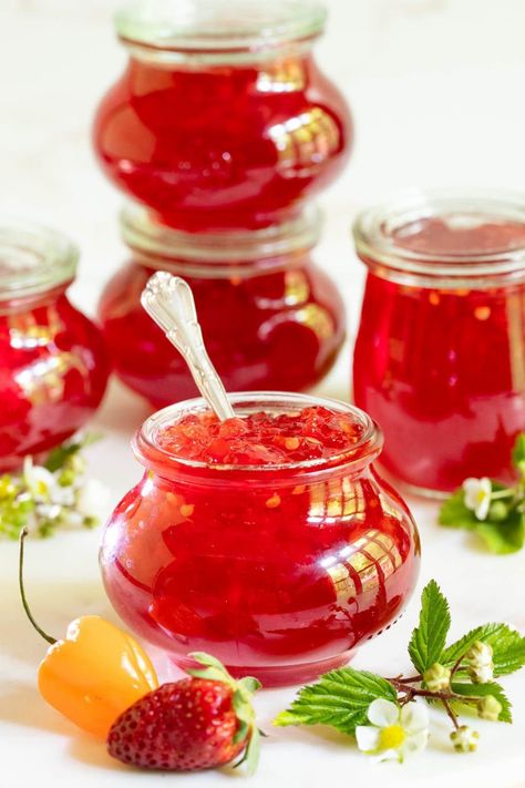 This Strawberry Habanero Pepper Jelly is sweet, spicy and oh-so-delicious! It\'s fabulous with cheese and charcuterie boards and so much more! #strawberryhabaneropepperjelly, #easypepperjelly, #strawberrypepperjelly Habanero Jelly Recipe, Habanero Pepper Jelly, Habanero Jam, Strawberry Jalapeno Jam, Habanero Jelly, Peach Freezer Jam, Pepper Jelly Recipe, Pepper Jelly Recipes, Strawberry Freezer Jam