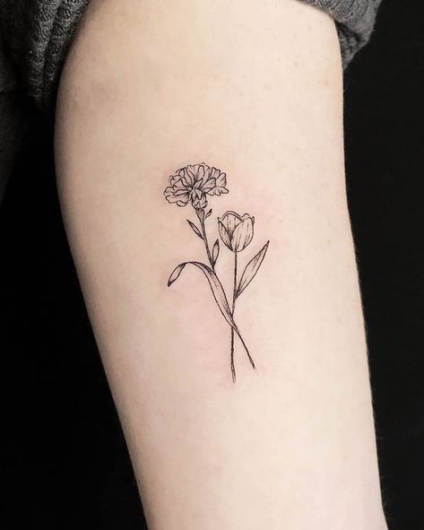 97 Beautiful Flower Tattoos and Meaning - Our Mindful Life Flower Tattoo Meaning Growth, Peony And Carnation Tattoo, Mom Flower Tattoo Ideas, Two Intertwined Flowers Tattoo, Birth Flower Carnation Tattoo, Roses And Chrysanthemums Tattoo, Tulip And Marigold Tattoo, Carnation And Tulip Tattoo, Poppy And Chrysanthemum Flower Tattoo