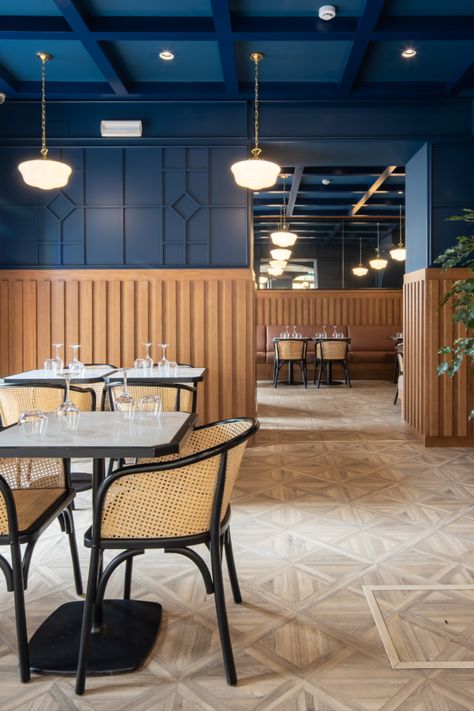 Navy Restaurant Interior, Restaurant Concept Ideas Interiors, Blue And Gold Restaurant Design, Deep Blue Interior Design, Blue And Yellow Restaurant Interior, Seafood Restaurant Interior Design, Blue Interior Restaurant, Blue Cafe Design, Dark Blue Restaurant